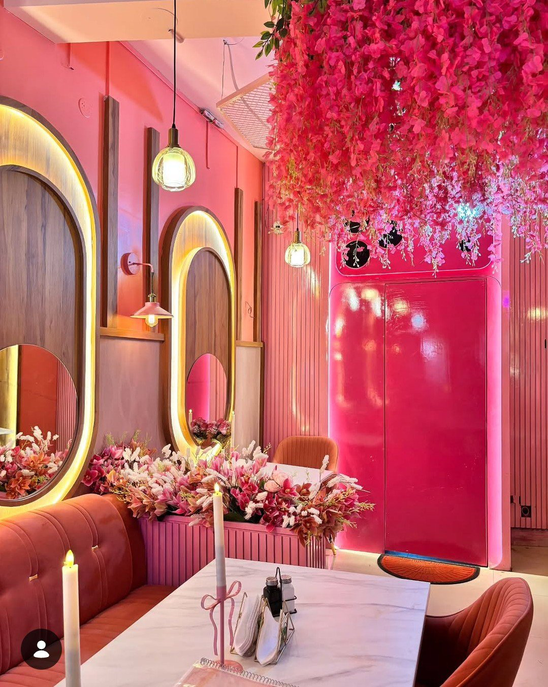 Bloomora interior, blush walls and blossoms