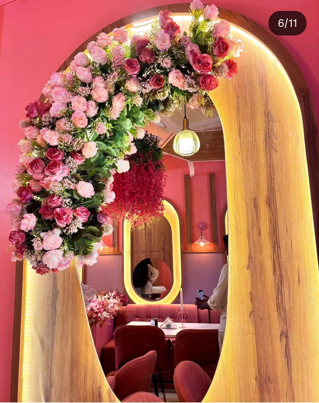 Golden lantern glow against pink panels